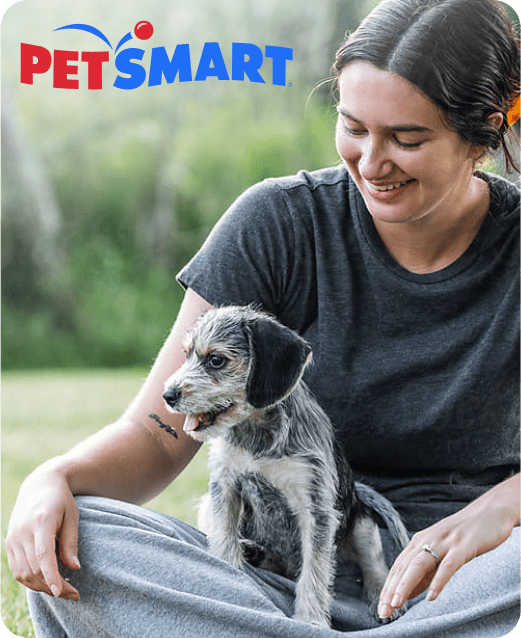 Woman sitting with a puppy