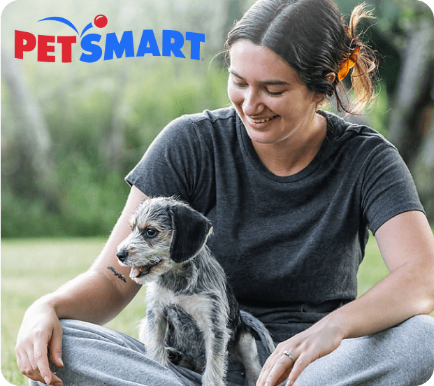 Woman sitting with a puppy